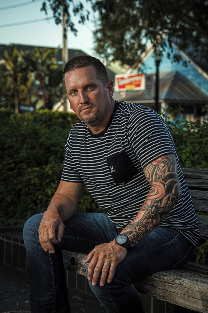 man sits on a park bench